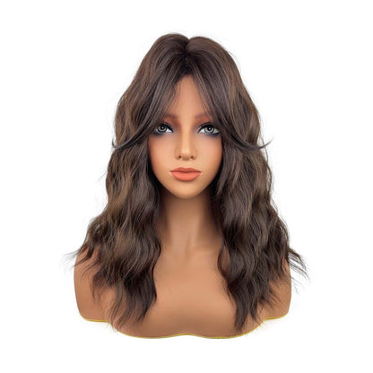 Wavy brown wig with bangs – front view on mannequin, white background